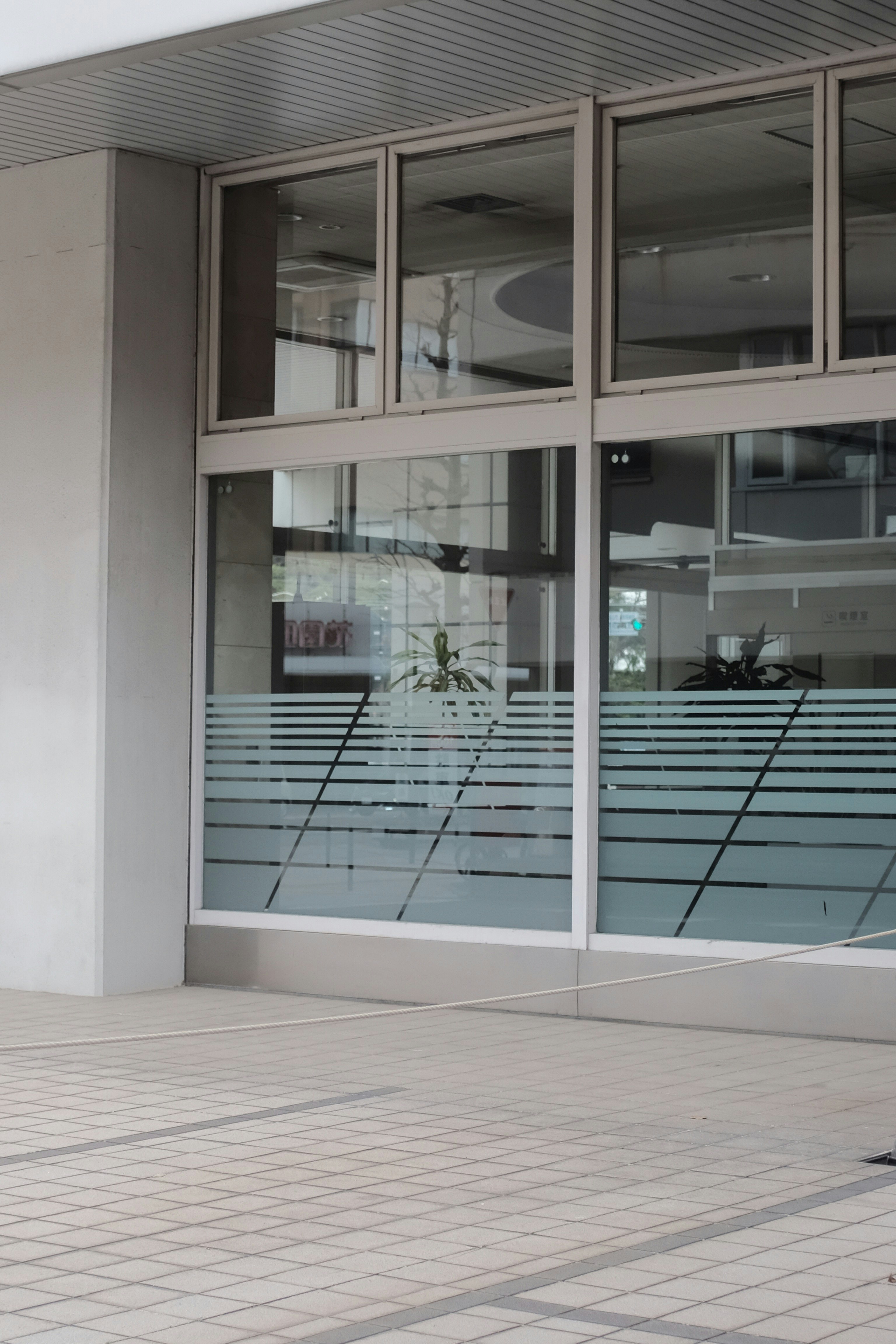 white framed glass door closed